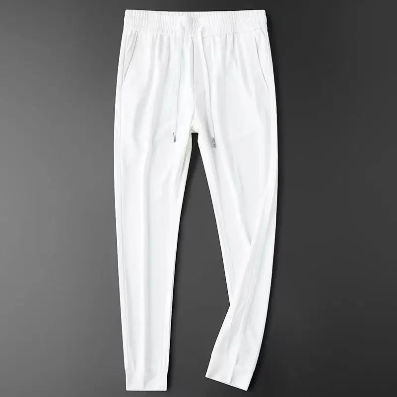 HEARUJOY  -  Casual Pants Men Fitness Sportswear Tracksuit Sping Autumn Bottoms Skinny Sweatpants Cotton Trousers Track Pants