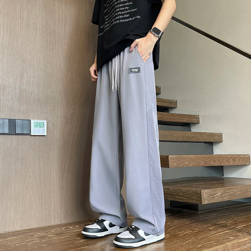 HEARUJOY  -  Summer Thin Ice Silk Mesh Quick Dry Elastic Pants Men Breathable Side Hollow Out Trousers Loose Sweatpants Men's Casual Pants