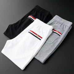 HEARUJOY  -  Casual Pants Men Fitness Sportswear Tracksuit Sping Autumn Bottoms Skinny Sweatpants Cotton Trousers Track Pants