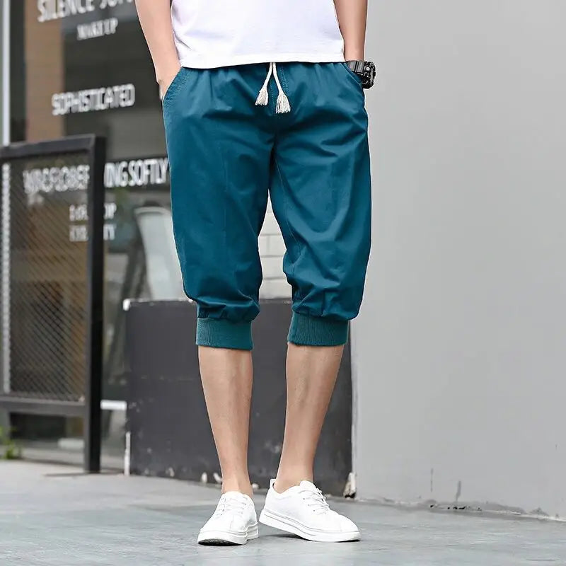 HEARUJOY  -  Summer New Sports Trend Versatile Casual Shorts Men's Solid Elastic Waist Drawstring Pockets Cotton Calf Length Cropped Pants