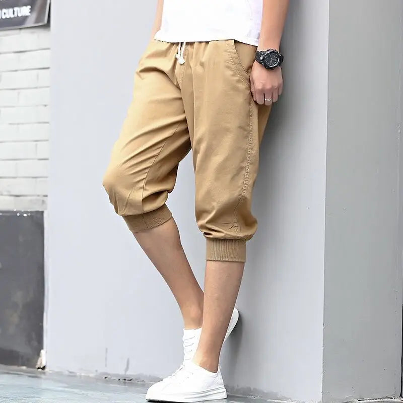 HEARUJOY  -  Summer New Sports Trend Versatile Casual Shorts Men's Solid Elastic Waist Drawstring Pockets Cotton Calf Length Cropped Pants
