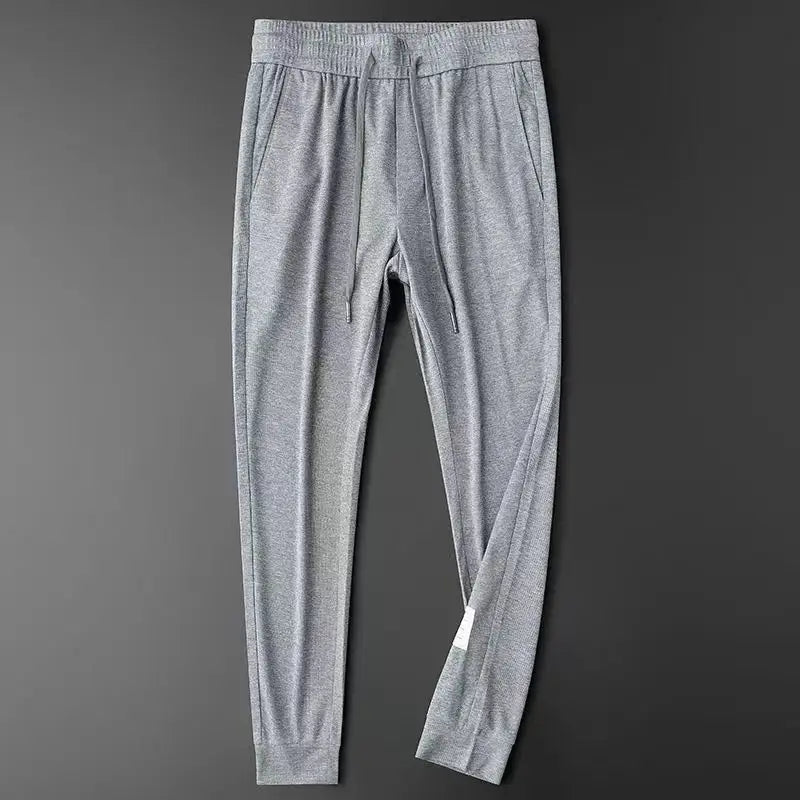HEARUJOY  -  Casual Pants Men Fitness Sportswear Tracksuit Sping Autumn Bottoms Skinny Sweatpants Cotton Trousers Track Pants