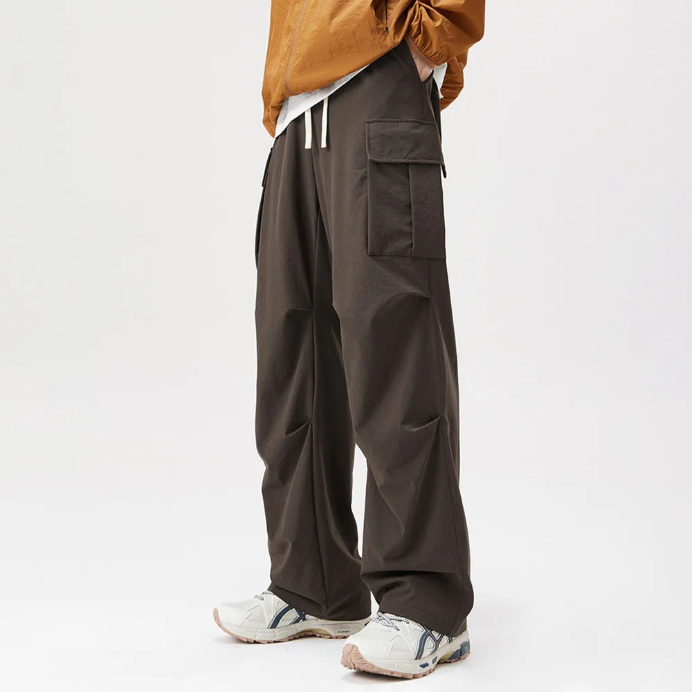 Hearujoy Autumn New Fashion Pleated Paratrooper Overalls Pants Men Outdoor Sports Big Pocket Mountain Wide Leg Casual Mens Pants