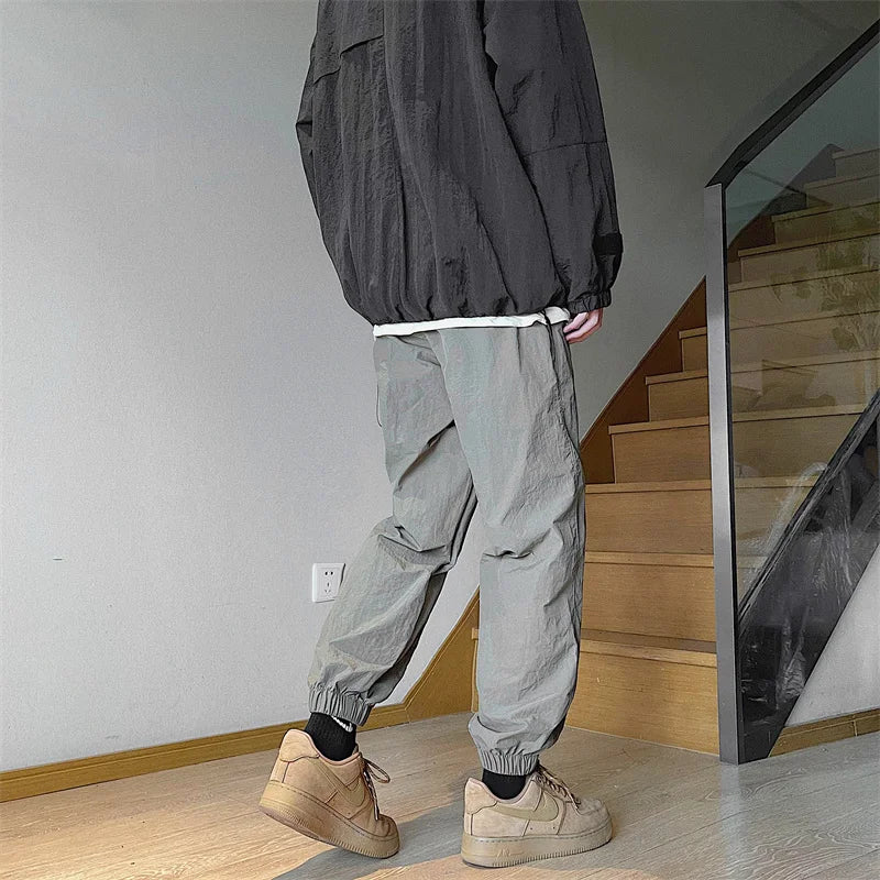 Hearujoy New Autumn Fashion Men's Loose Casual Leggings Outdoor Waterproof Assault Pants Street Black Overalls Men Clothing